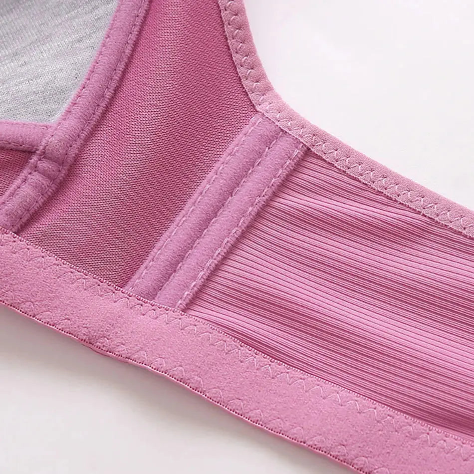 A stylish lace push-up nursing bra with a wire-free design for gentle lift and full support. Features easy-access nursing clips for convenience, made from a breathable nylon-polyester blend. Available in Black, Gray, Red, Purple, Skin Color, and Cameo Brown.